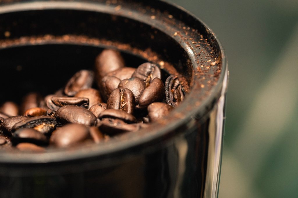 Coffee beans in a cup